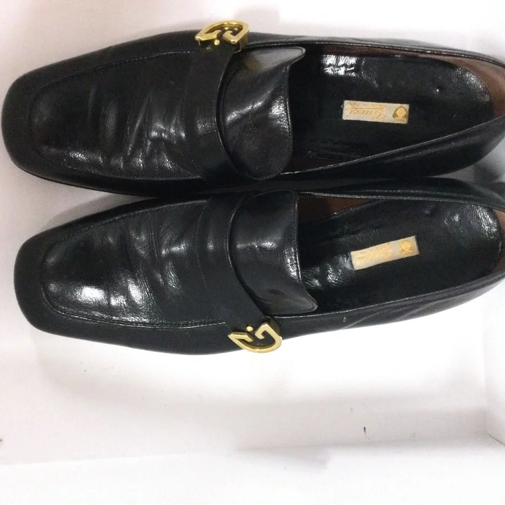 Classic Black Leather Slip-On Loafers with Gold Hardware